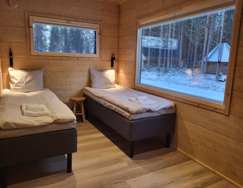 Neljän hengen rantahuvila twin makuuhuone